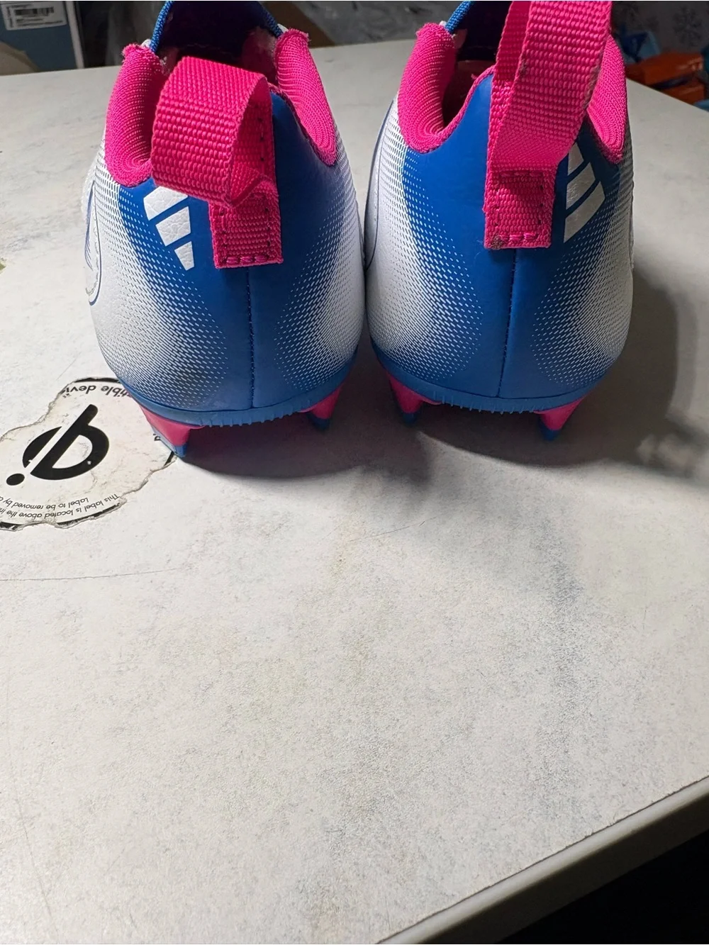 Kids White & Blue Athletic Cleats with Pink Trim